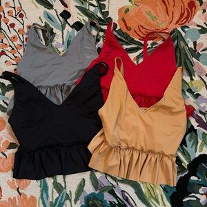 Lot of 4 peplum Kortni Jeane Swim tops